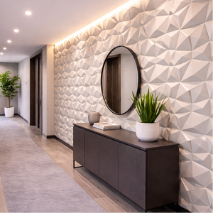 White geometric 3D wall panels behind a console and round mirror — Sona Casa