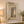 Decorative wall mirror with geometric design in a home setting