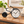 Black bicycle-shaped metal table clock with a white dial – bicycle table clock on a wooden console